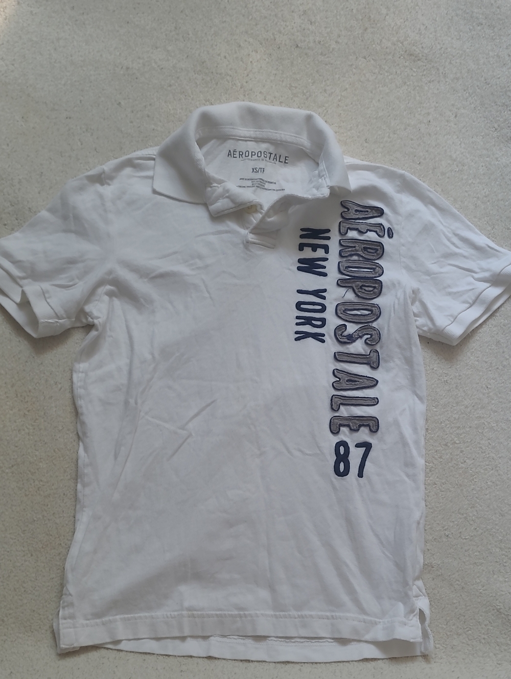 Aeropostale White Polo with Navy Vertical Logo
